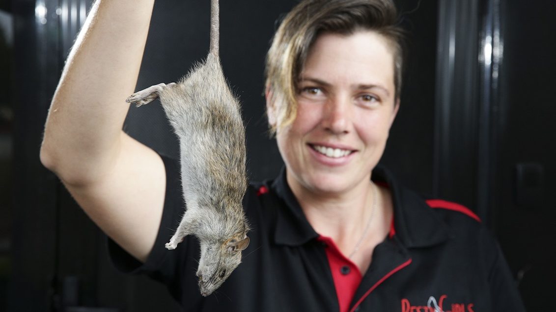 Lady holding rat